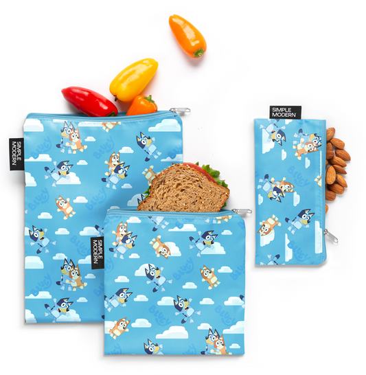 Three sky blue pouches with white clouds and vibrant orange, red, and yellow accents